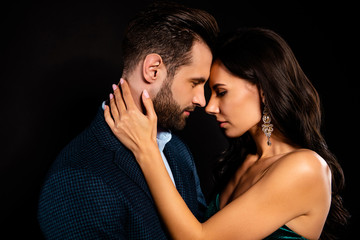 Close-up profile side view portrait of his he her she nice-looking attractive lovely luxurious passionate two person caressing St Valentine day event isolated over black background
