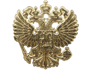 National emblem of the Russian Federation of the yellow metal. Fragment of a coin close up. Isolate