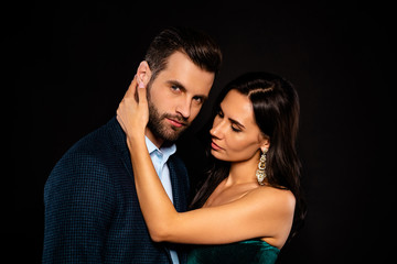 Close up side profile photo beautiful she her wife earrings he him his husband married spouse celebrities pop stars actors hand face want kiss wear costume jacket green dress isolated black background