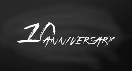 Fototapeta premium 10 anniversary logo concept. 10th years birthday icon. Isolated golden numbers on chalkboard background. Vector illustration. EPS10.