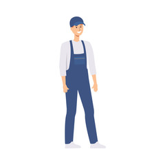 Young caucasian male delivery man standing in work overalls and smiling.