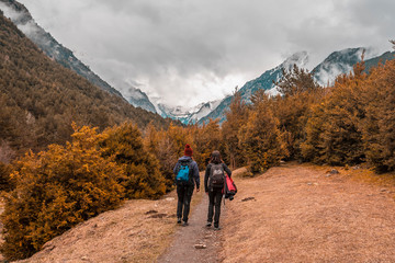 Two sisters trekking in the Aig&uuml;estortes National Park in the Pyrenees