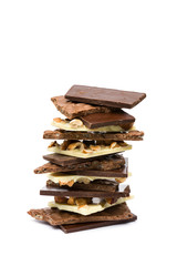 pile of mixed chocolate pieces, on white background