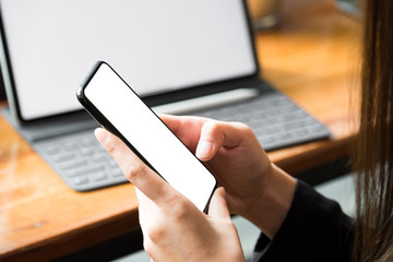 business woman holding cellphone with big blank screen, empty space