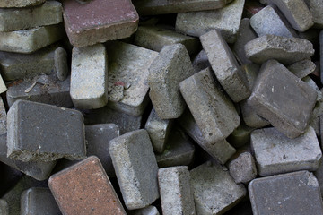 pile of cement cube shape bricks road paving 