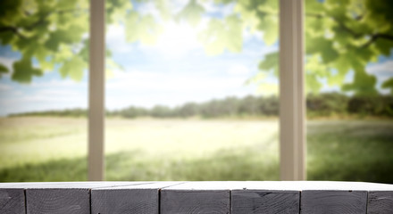 Fototapeta premium Desk of free space and summer window background 