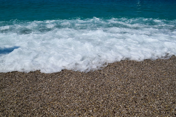 Deep blue stormy sea water surface with foam and waves pattern, natural background photo