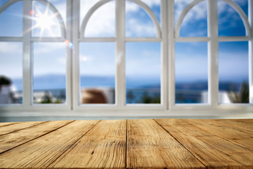 Desk of free space and summer window background 