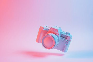 Puzzle cube floating with shadow over pink background