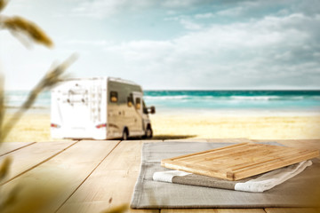 desk of free space and beach background 