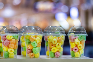 Sweet chewy sweets and marmalades in a glass at bar
