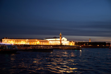 Fototapeta na wymiar St. Petersburg, Russia. Neva river and Old Exchange building on the Spit of Vasilievsky Island in the summer evening