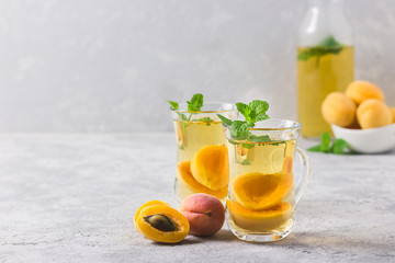 Apricot mint green tea. Selective focus, space for text.