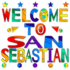 Welcome to San Sebastian - cute multocolored inscription. San Sebastian or Donostia is a coastal city and municipality located in the Basque Autonomous Community, Spain.
