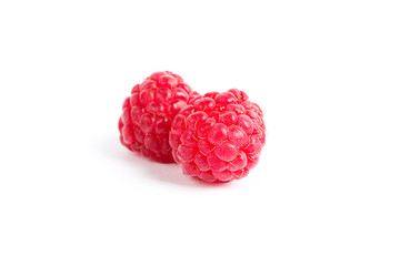 Fresh sweet raspberries isolated on white background