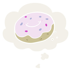 cartoon donut and thought bubble in retro style