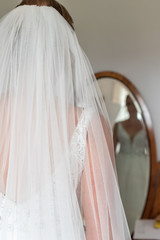 Bride in front of mirror