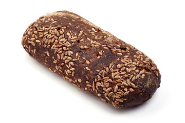 Rye bread with sesame seeds, close-up, isolated on white background