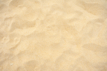 Fototapeta na wymiar Yellow beach sand texture.