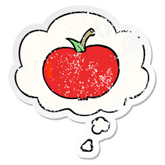 cartoon apple and thought bubble as a distressed worn sticker