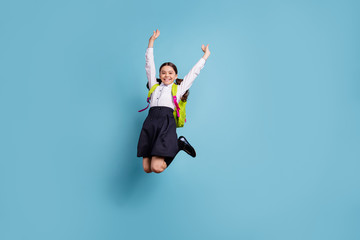 Fototapeta na wymiar Full size photo of crazy school lady jump high classroom friends 1 september wear white shirt skirt suit isolated blue background