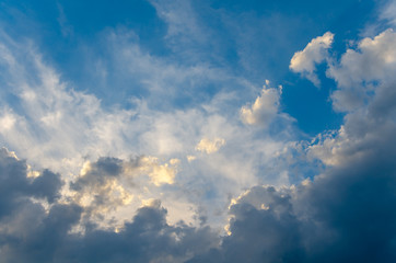Naklejka na ściany i meble Blue sky background with abstract clouds