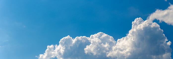 Panorama of blue sky with white cumulus clouds - obrazy, fototapety, plakaty
