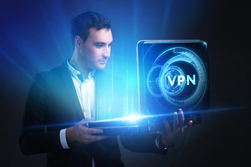 The concept of business, technology, the Internet and the network. A young entrepreneur working on a virtual screen of the future and sees the inscription: VPN