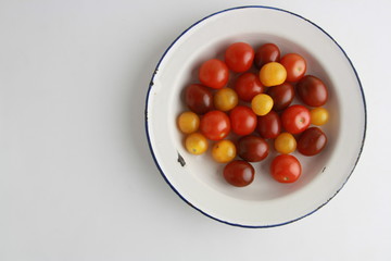 Naklejka na ściany i meble Three varieties of cherry tomatoes