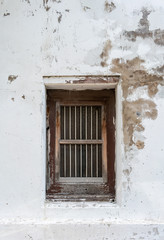 Fototapeta na wymiar Asian style antique vintage wooden window on old white wall