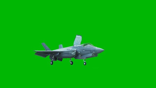 F-35 fighter takes off vertically from the aircraft carrier in clear day. Contains the alpha channel.