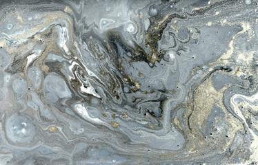Marbling pattern. Golden powder marble liquid texture.