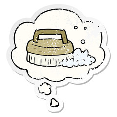 cartoon scrubbing brush and thought bubble as a distressed worn sticker