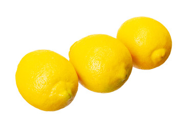Row of three ripe yellow lemons