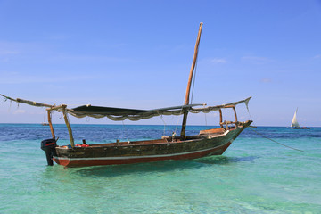 Fototapeta na wymiar wooden boat in ocean