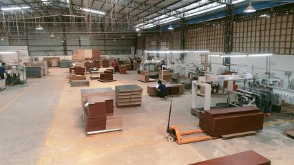 Cnc machine in a furniture factory, working cnc woodworking machine in a furniture factory