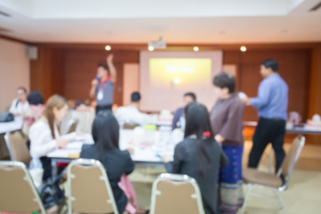 blurry image. speaker or lecturer with startup business team brainstorming on meeting workshop....