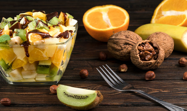 White Bowl Of Fresh Healthy Fruit Salad On Wooden Background - Powered by Adobe
