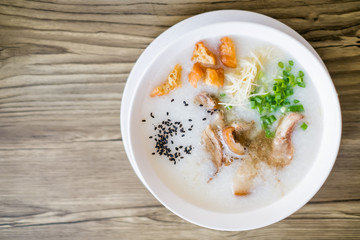 Thai style rice boiled with pork in bowl