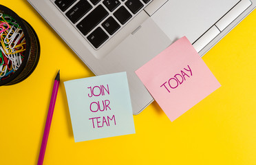 Text sign showing Join Our Team. Business photo text inviting someone to join in your local group or company Trendy metallic laptop sticky notes clips container pencil colored background