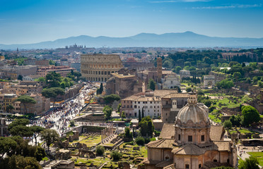 Fototapeta na wymiar Aerial view of Roman Forum and Coliseum in Rome, Italy.