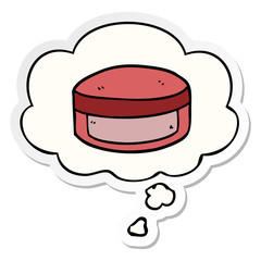 cartoon beauty lotion tub and thought bubble as a printed sticker