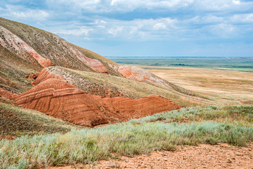 View of the vast expanses of the steppe from the side of the mountain Big Bogdo. A unique natural...