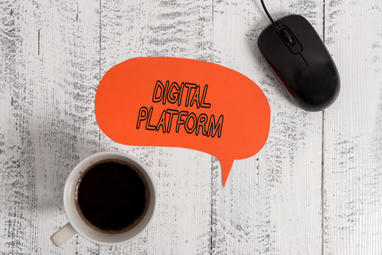 Conceptual hand writing showing Digital Platform. Concept meaning marketing campaign or branding new product service Wooden vintage table background coffee cup speech bubble