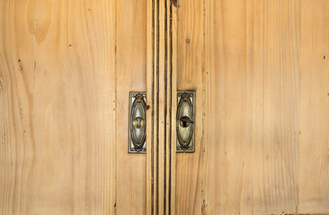 Closeup of vintage brown closet doors, vintage design beauty