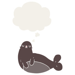 cartoon seal and thought bubble in retro style