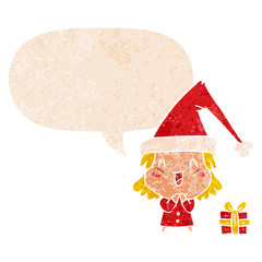 cartoon girl wearing christmas hat and speech bubble in retro textured style