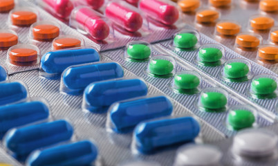 Tablets in large quantities. Images for the pharmaceutical industry. The concept of medicine.