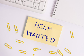 Conceptual hand writing showing Help Wanted. Concept meaning An ad in the paper an employer places...