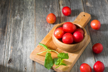 Red plum. Healthy diet. Light grey background